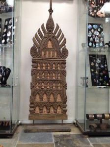 Hand-carved Wooden Temple with Buddha Inlays: